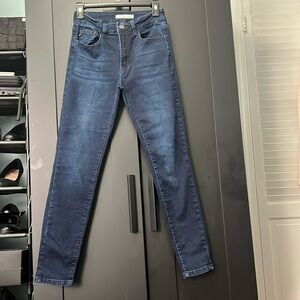 Kancan Stretchy denim jeans. Women’s size 5. Dark blue with dark stitching.